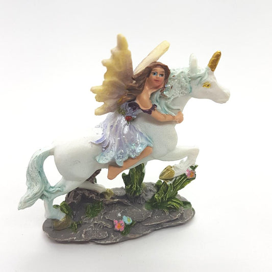 Fairy Hugging Her Unicorn