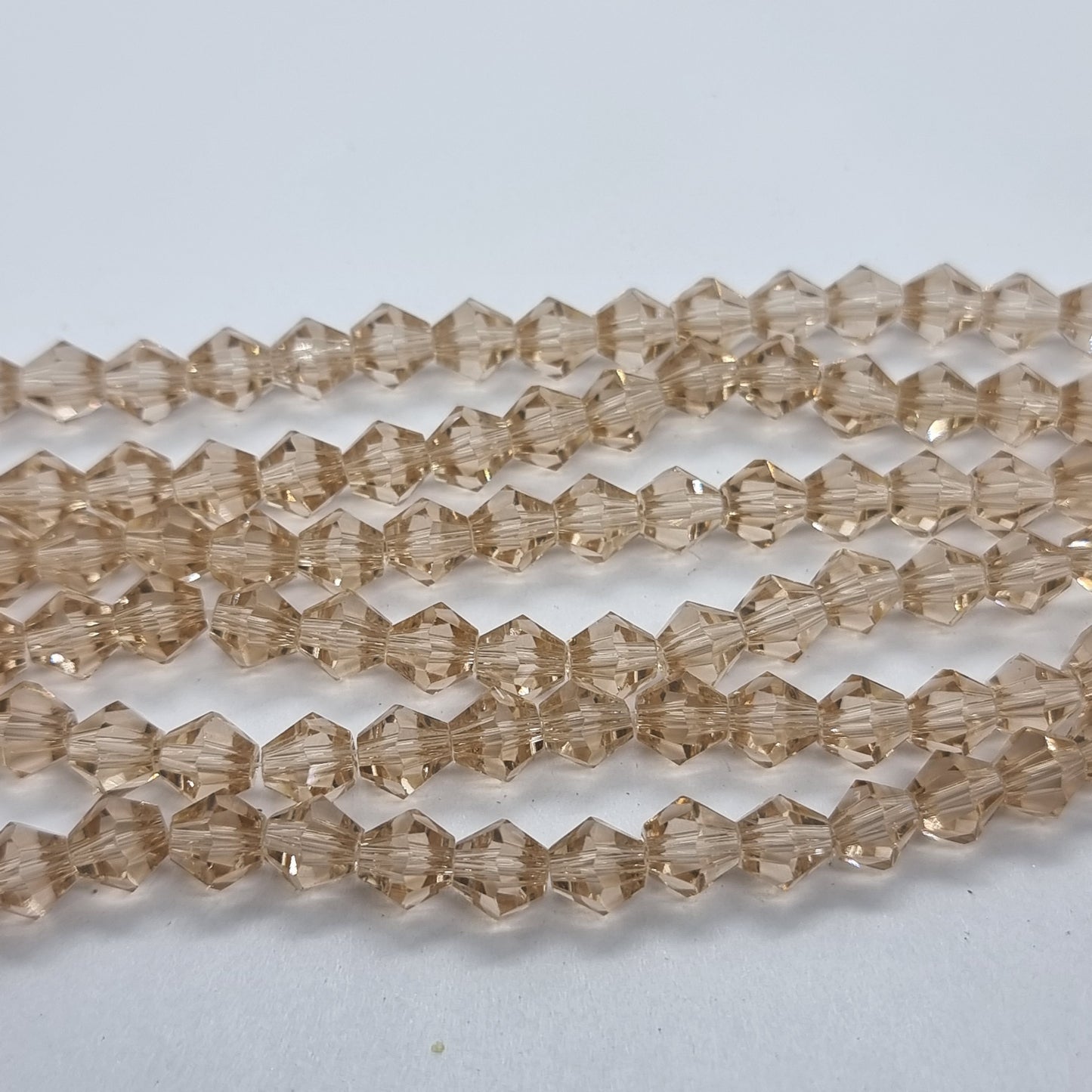 6mm Pale Peach Glass Bicones