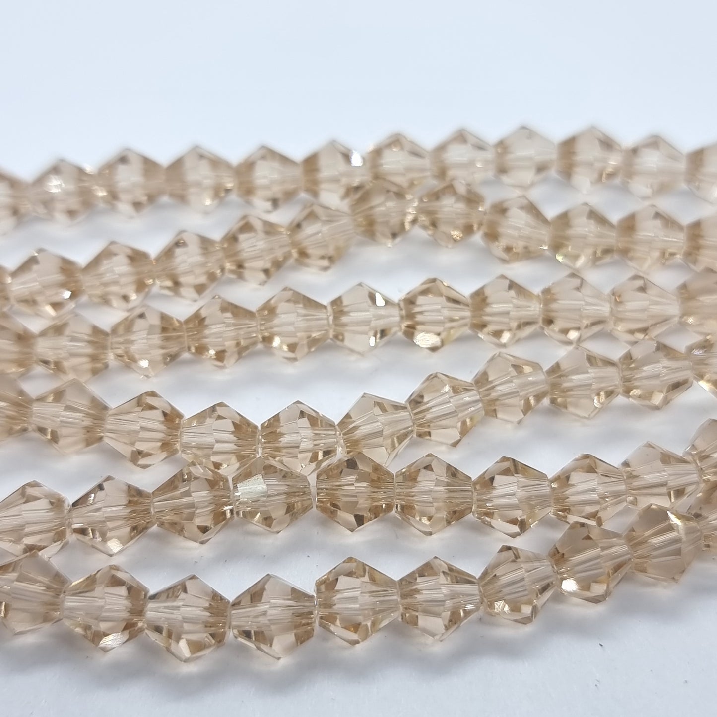 6mm Pale Peach Glass Bicones