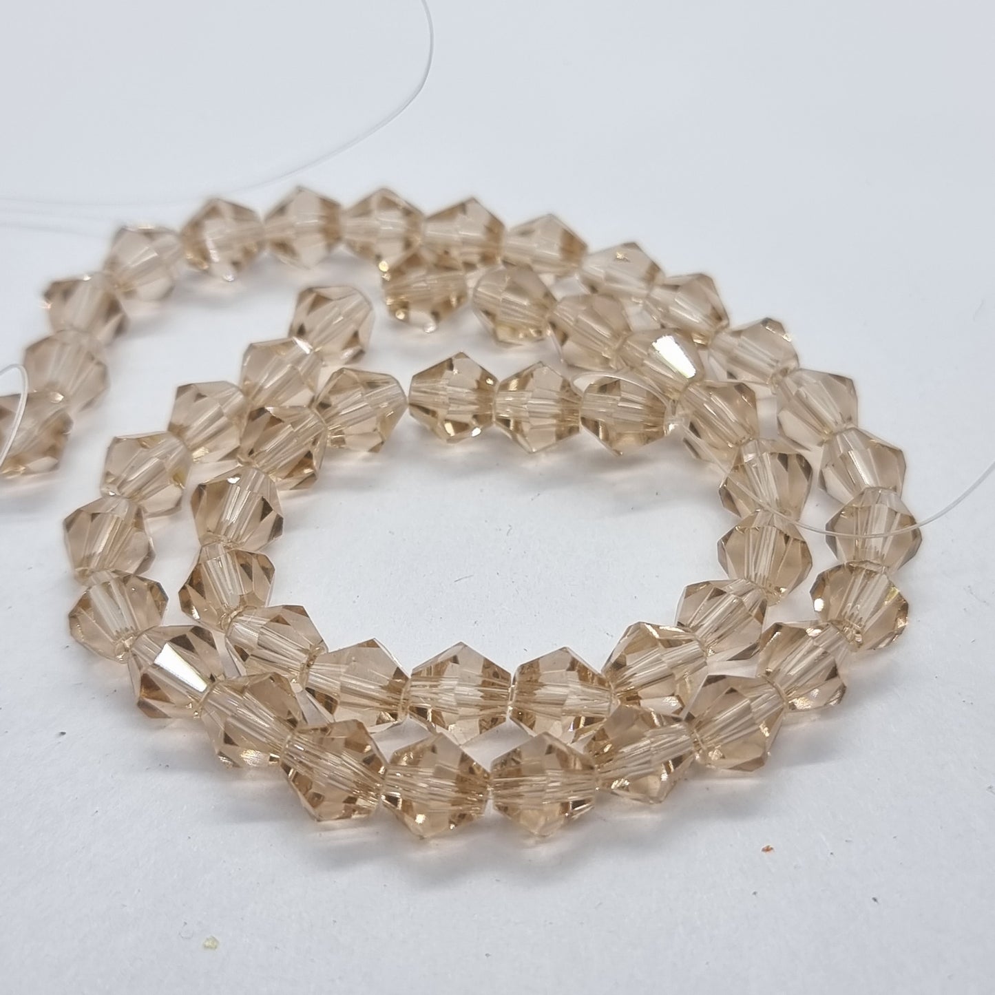 6mm Pale Peach Glass Bicones