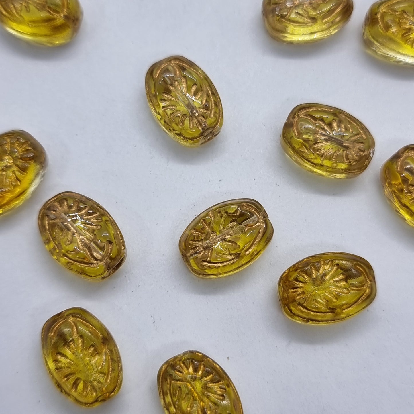 12pc Golden Inlaid Oval Glass Beads