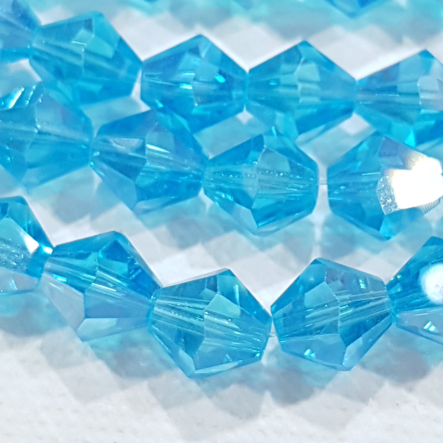 8mm Blue AB Glass Bicones