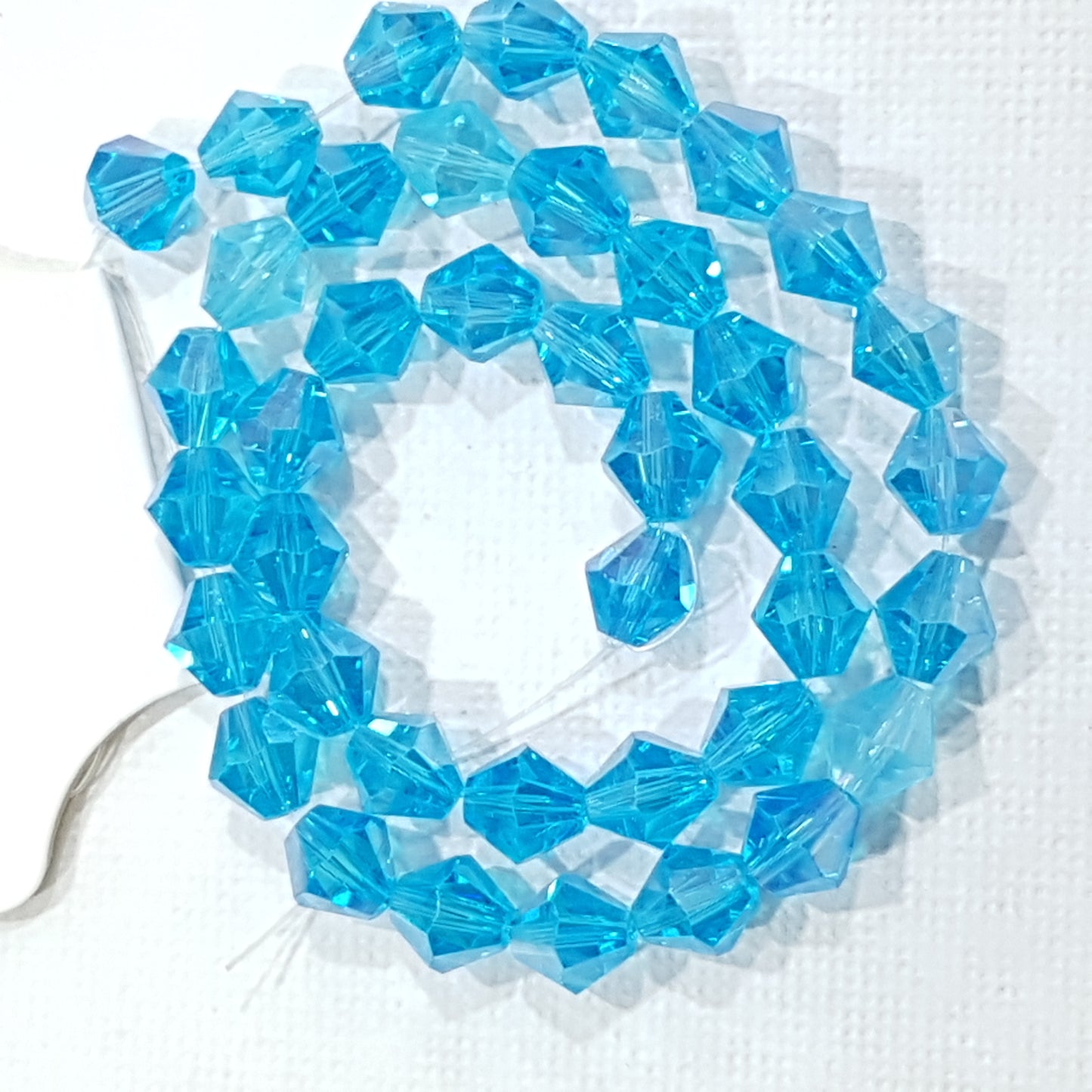 8mm Blue AB Glass Bicones