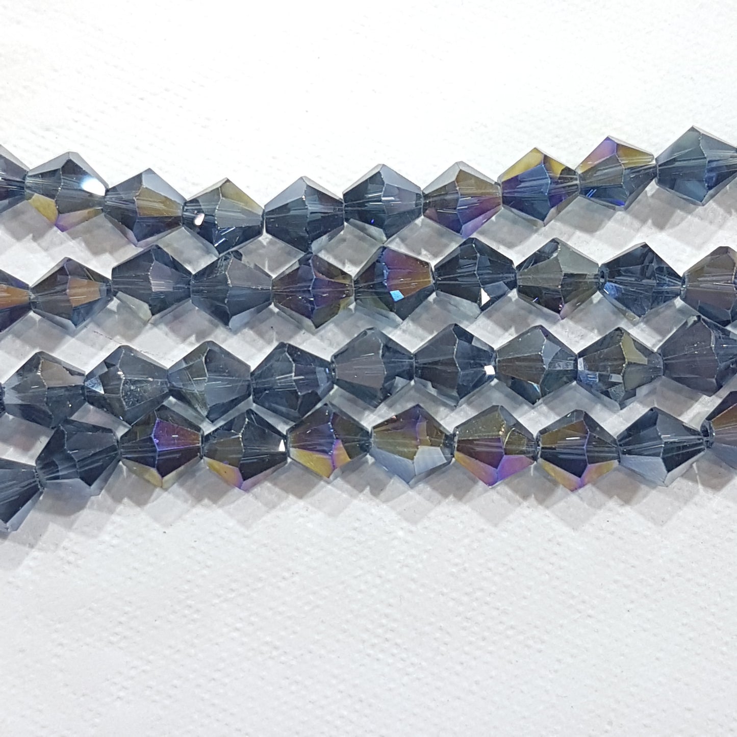 8mm Blue Grey AB Glass Bicones