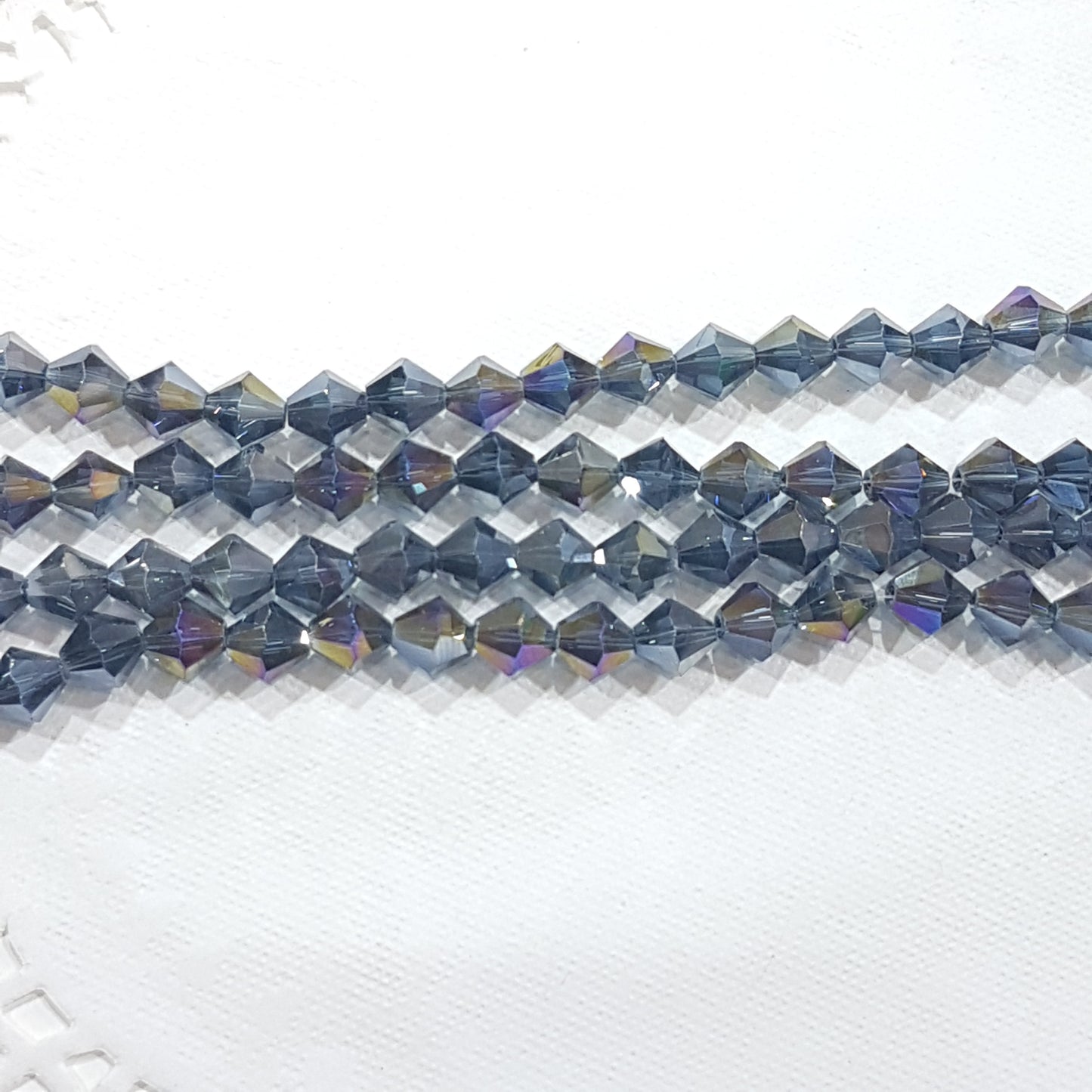 8mm Blue Grey AB Glass Bicones