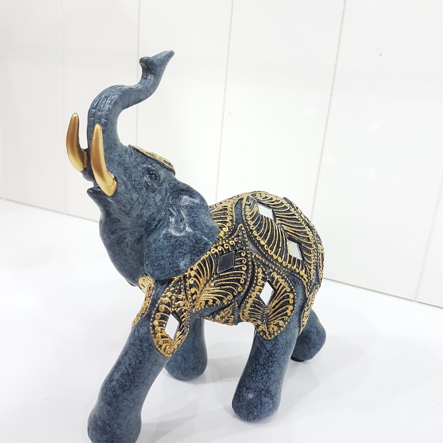 Resin Elephant with Peacock Feathers