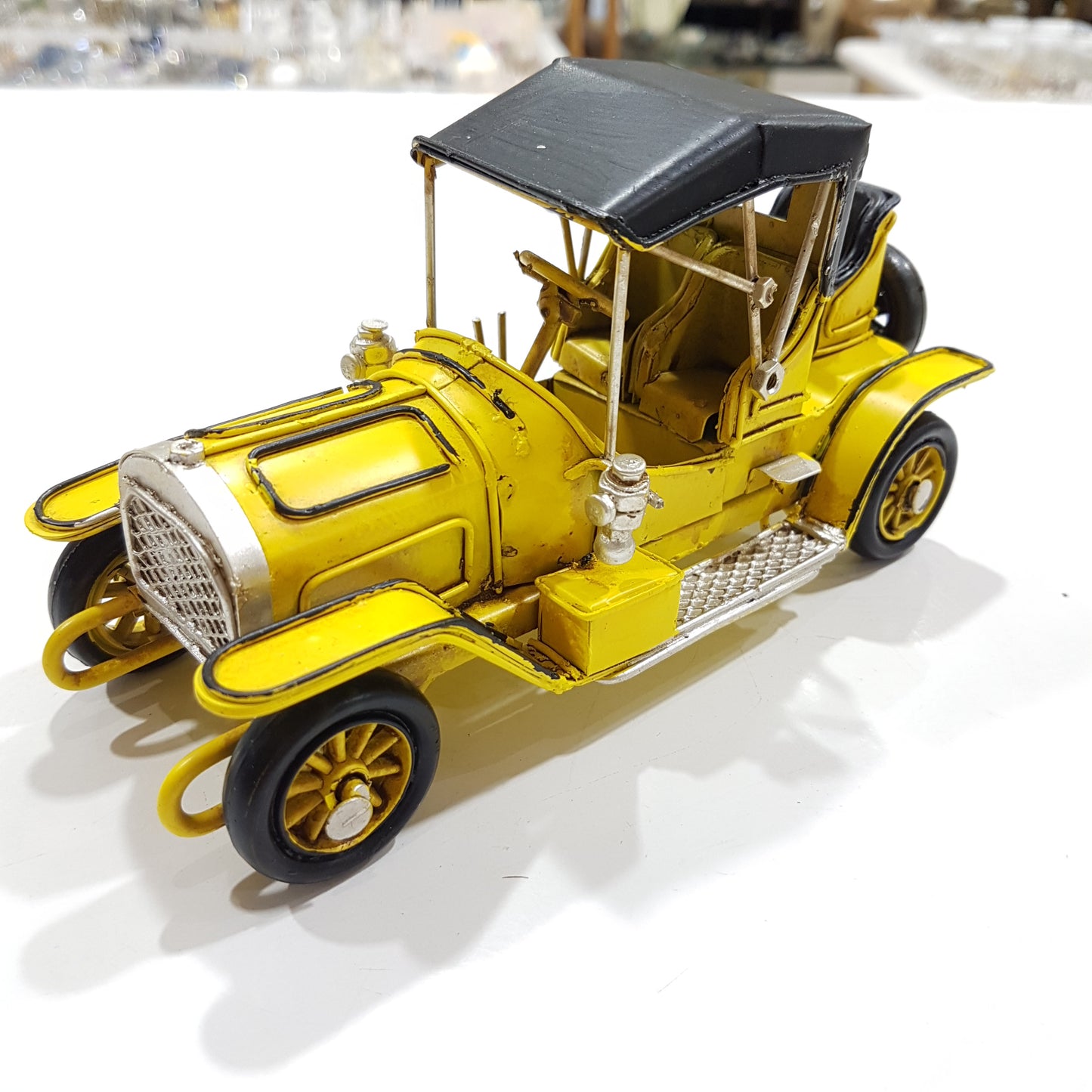 Small Yellow Vintage Model Car