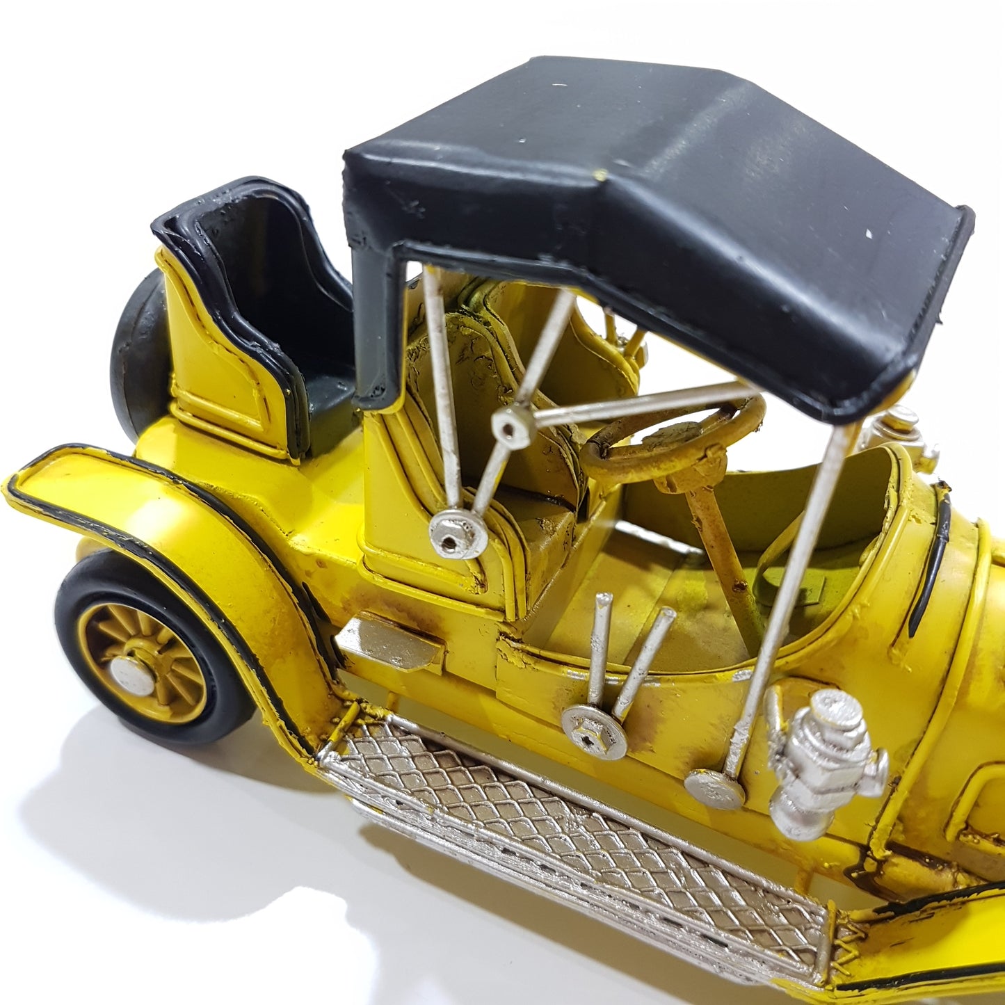 Small Yellow Vintage Model Car