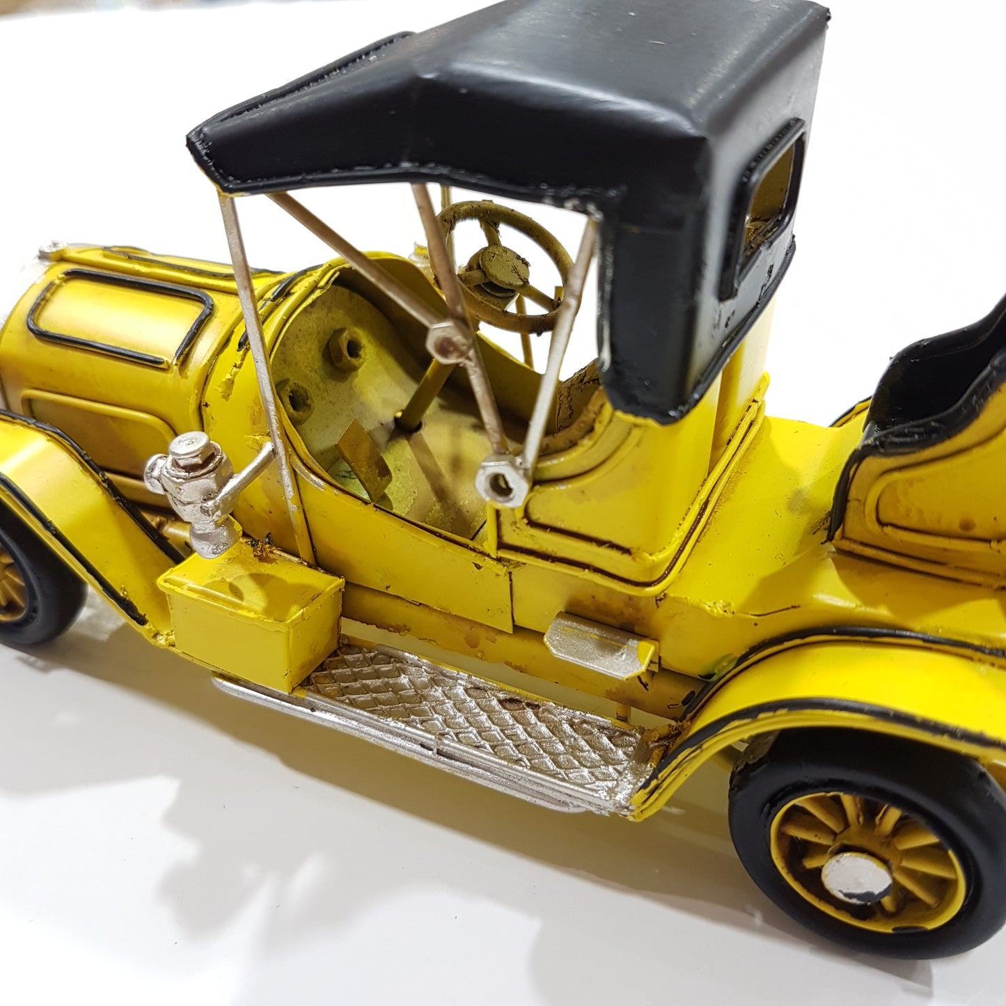 Small Yellow Vintage Model Car