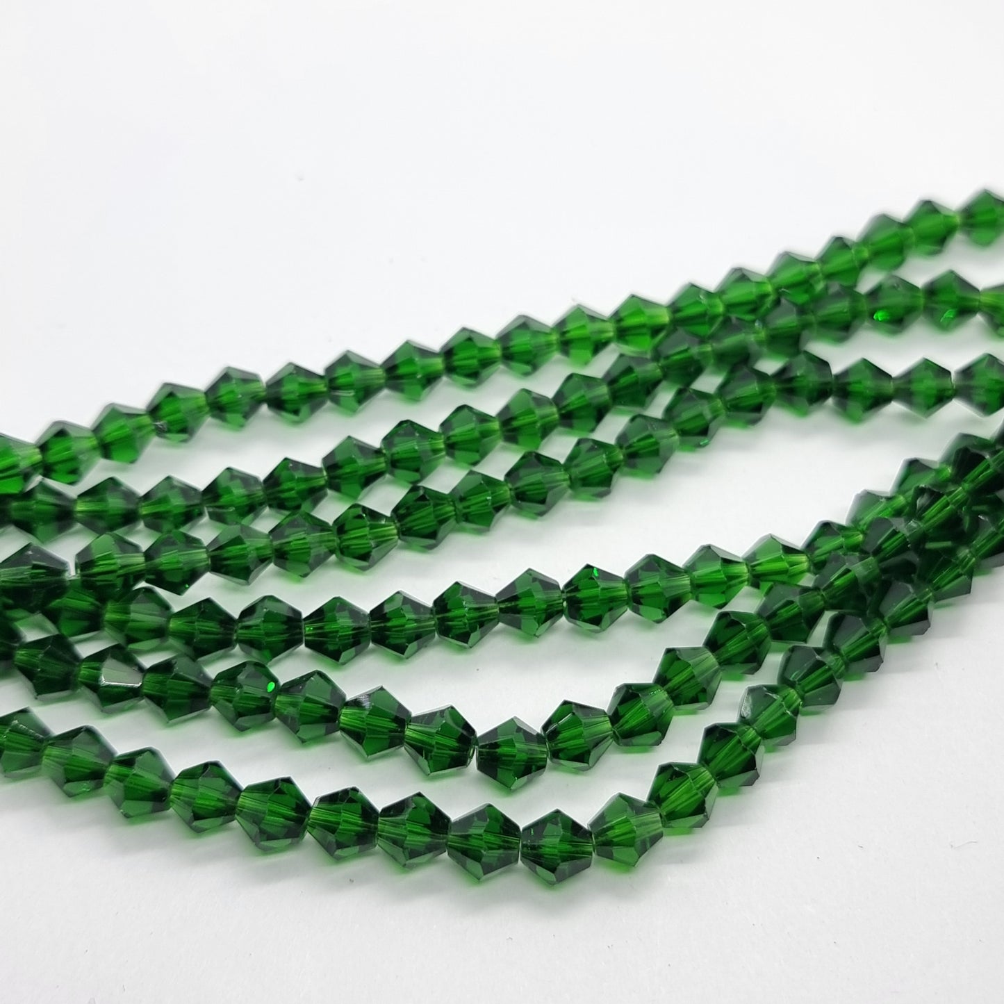 6mm Emerald Green Glass Bicones