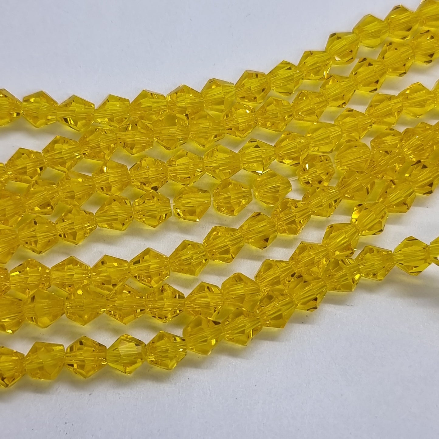 6mm Yellow Glass Bicones