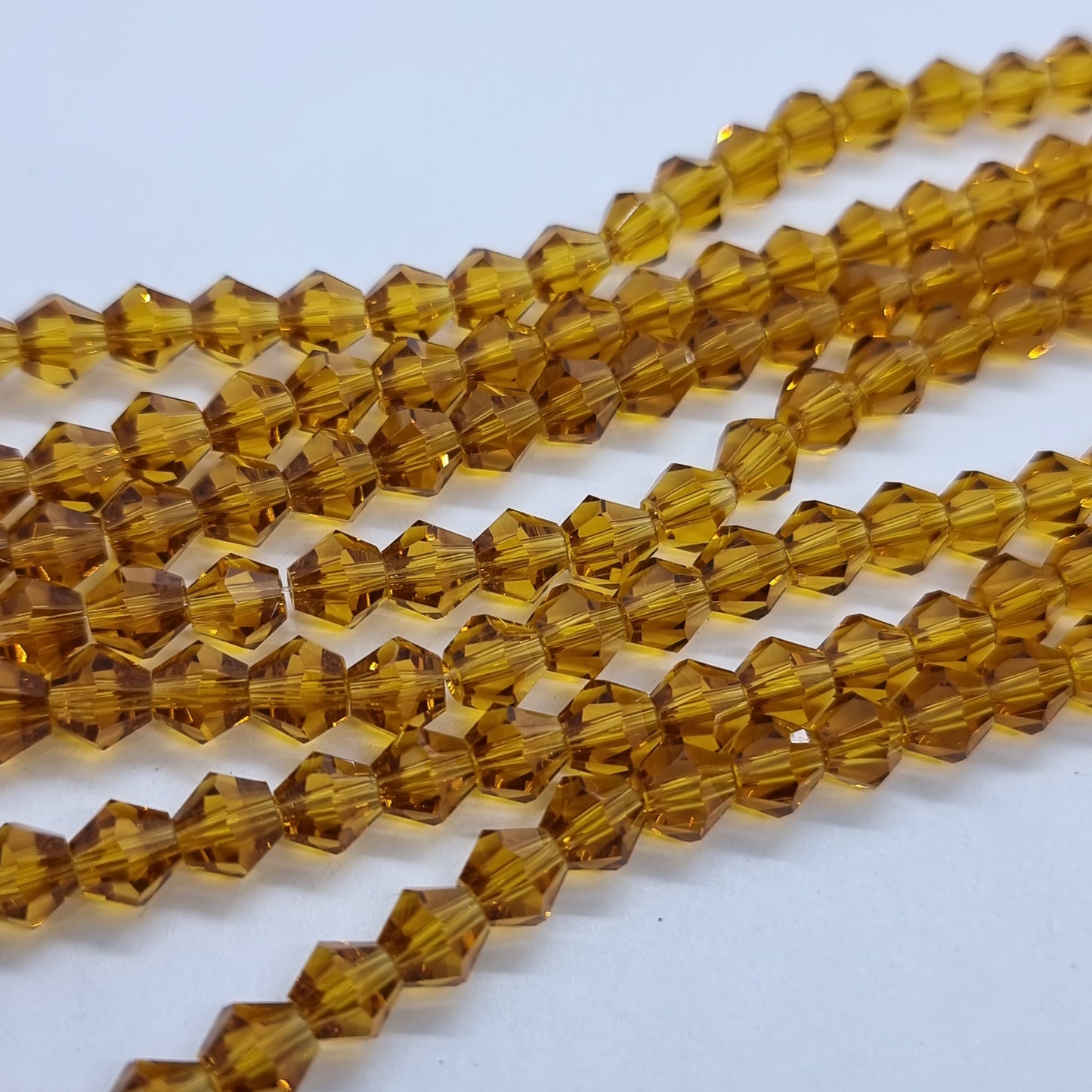 6mm Honey Gold Glass Bicones