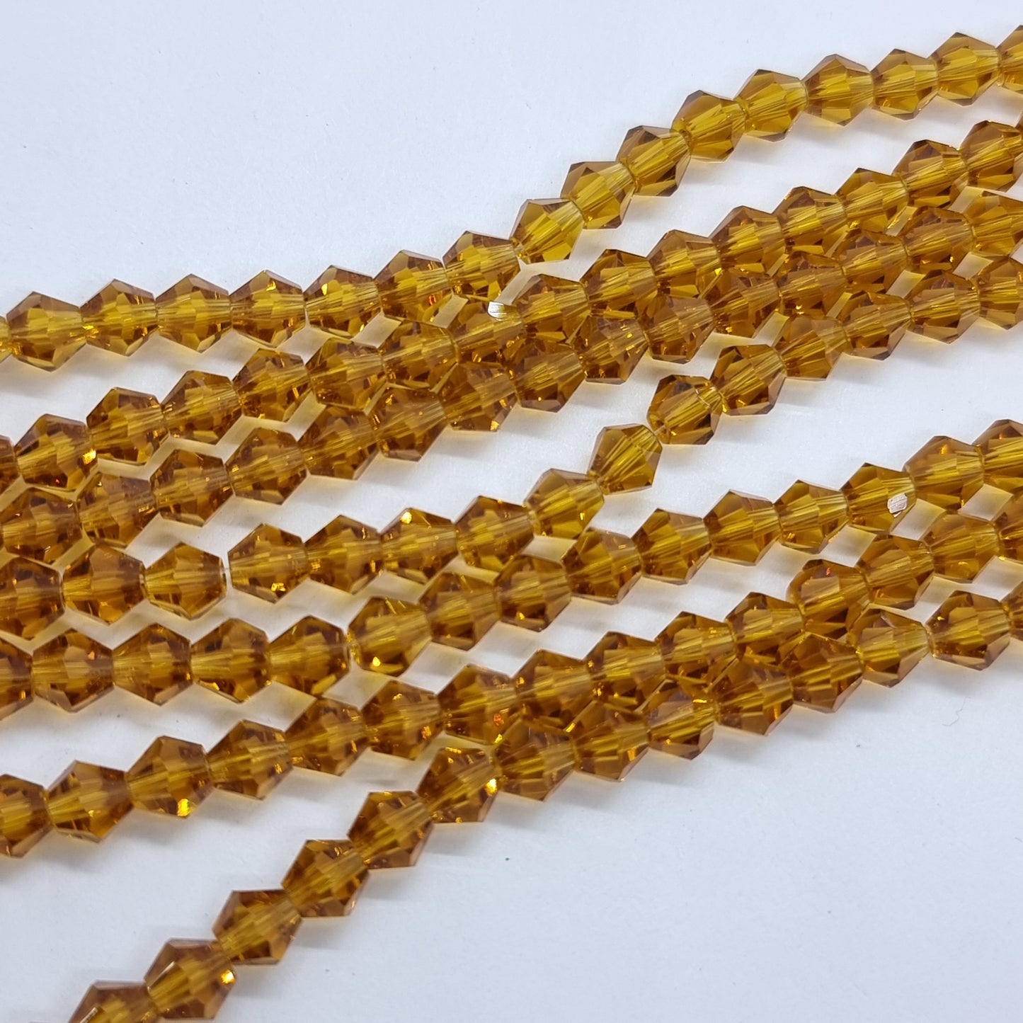 6mm Honey Gold Glass Bicones