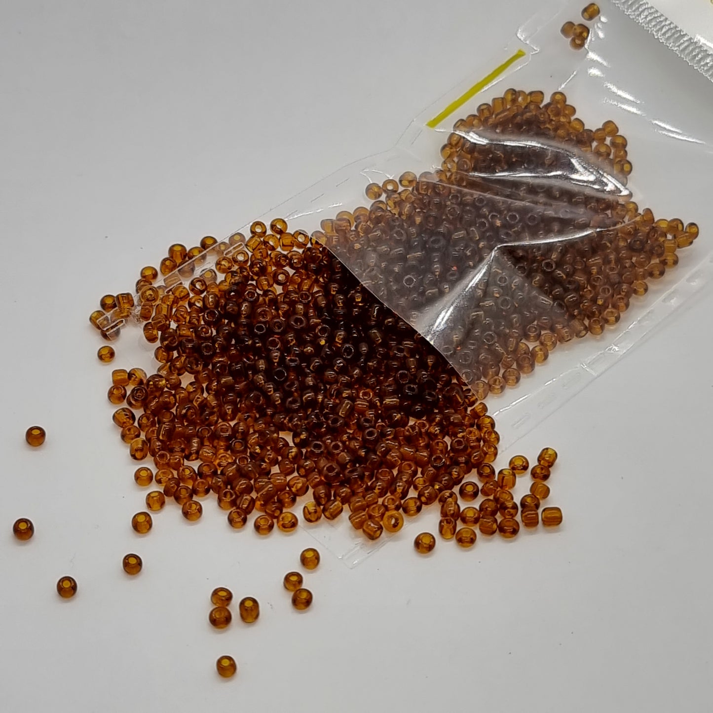 15g 2mm Brown Transparent Seed Beads