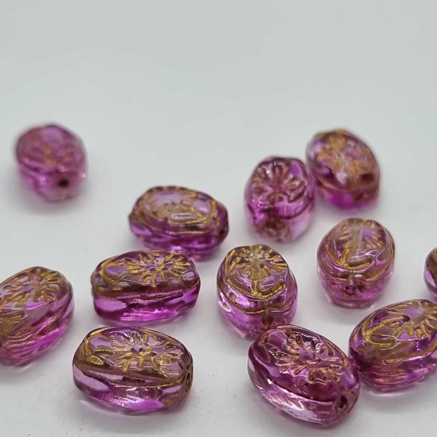 12pc Gold Inlaid Fuchsia Oval Glass Beads