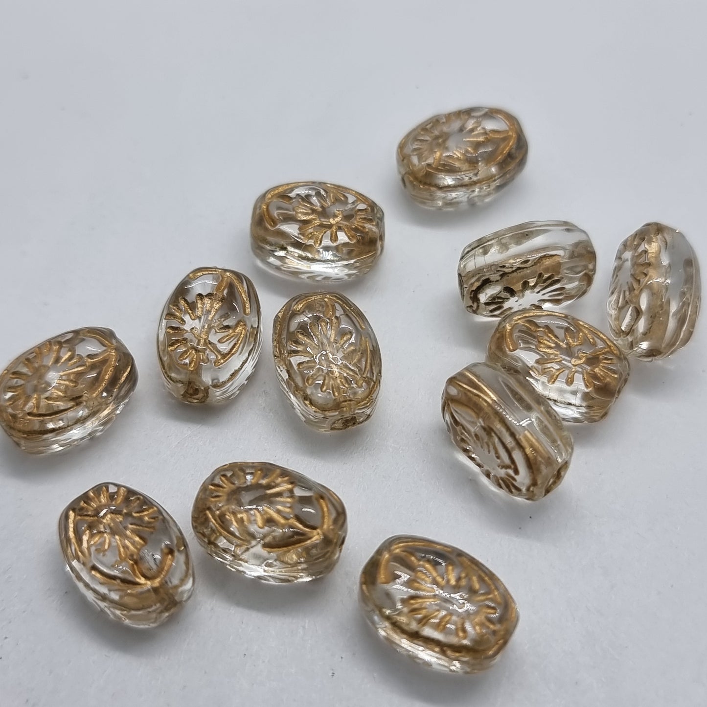 12pc Gold Inlaid Clear Oval Glass Beads