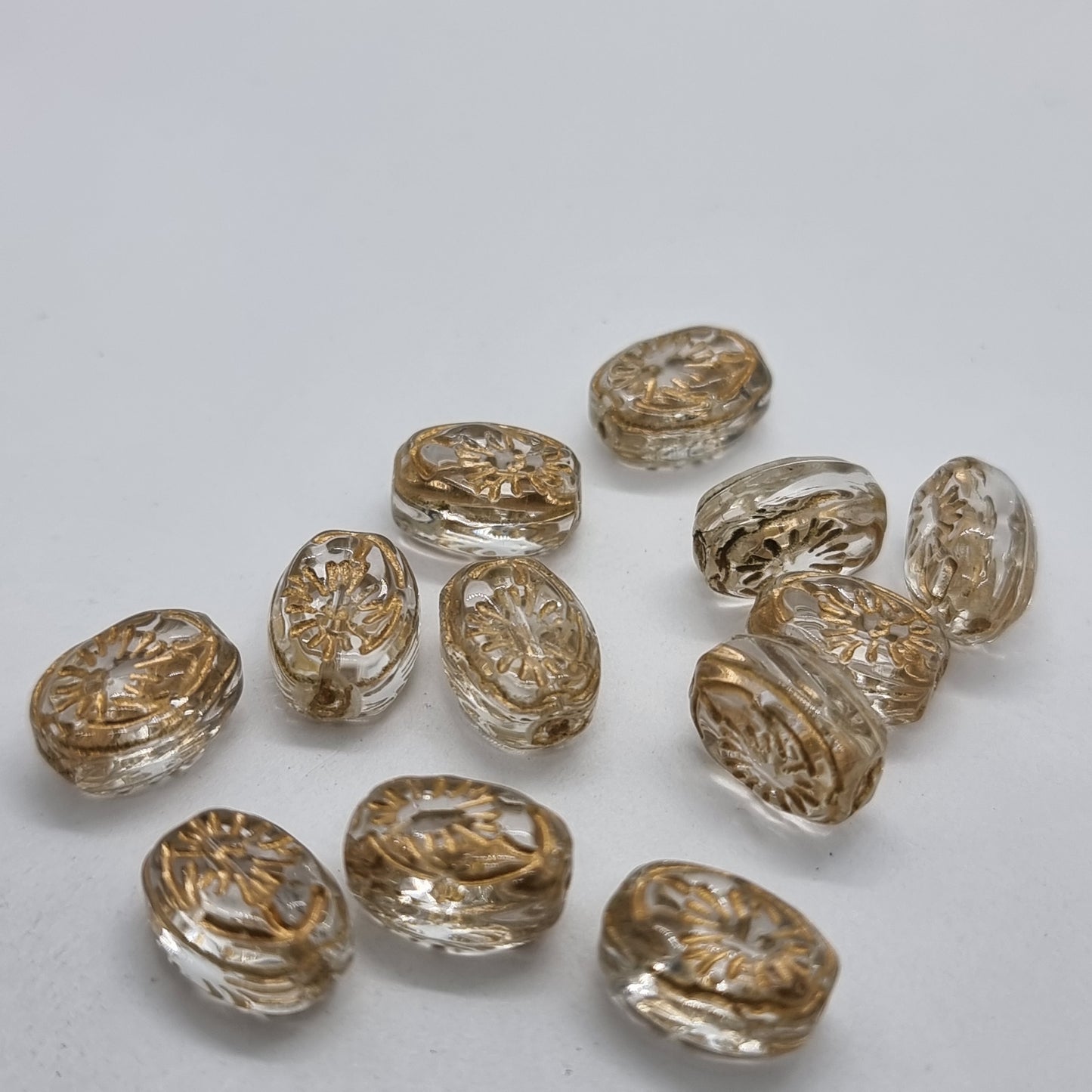 12pc Gold Inlaid Clear Oval Glass Beads