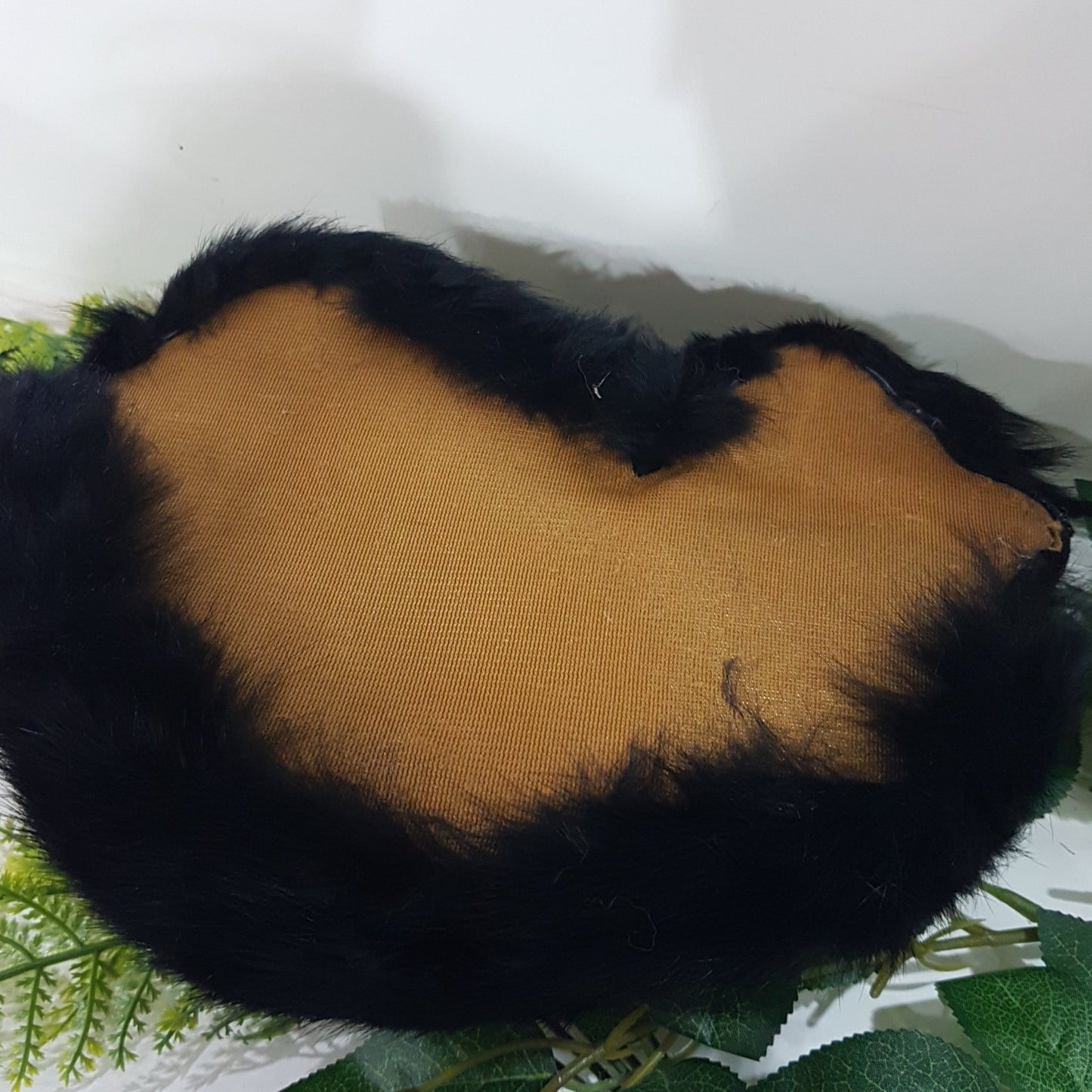 Black Lifelike Sleeping Cat Toy With Grey Around The Eyes