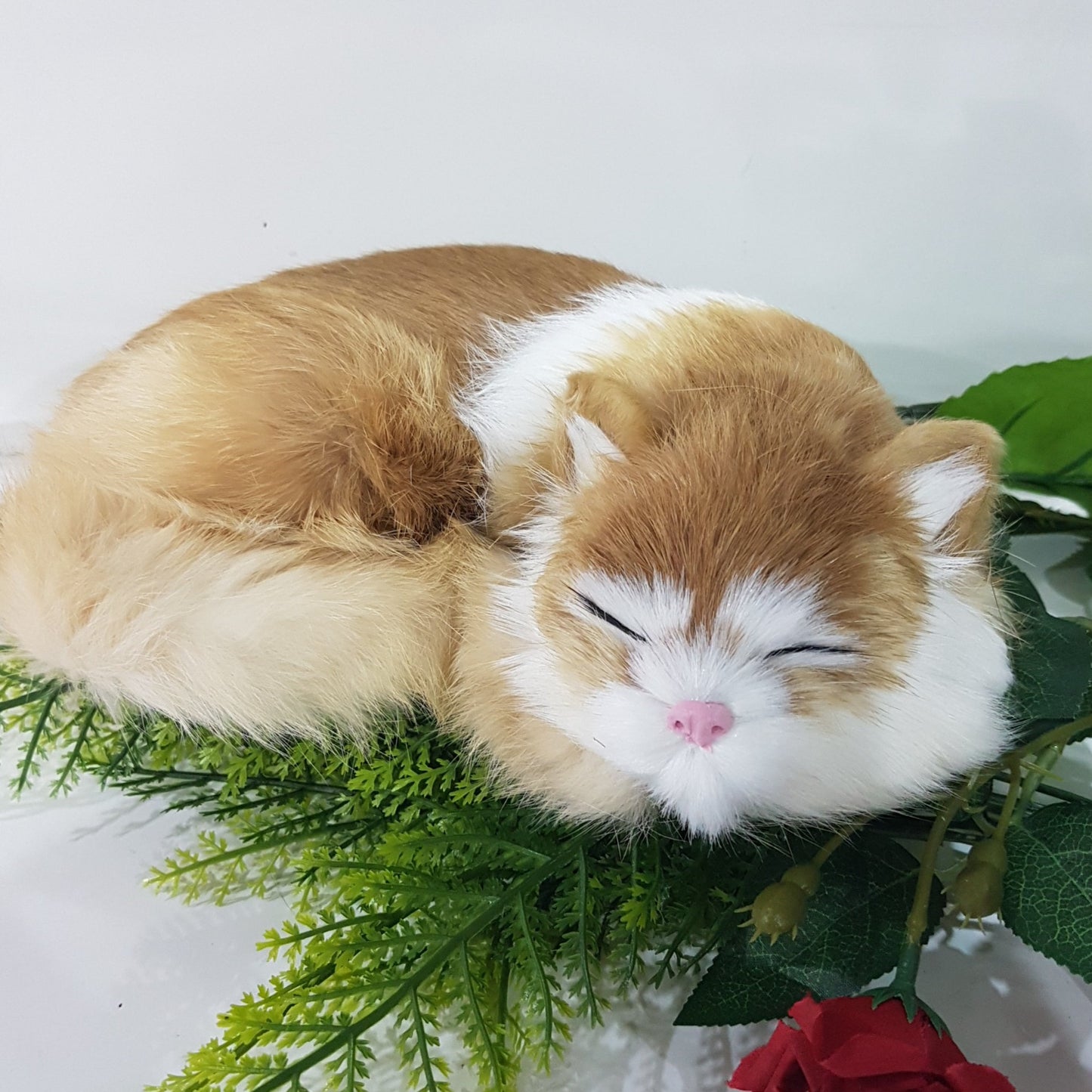 Ginger Lifelike Sleeping Cat Toy With White Stripe.