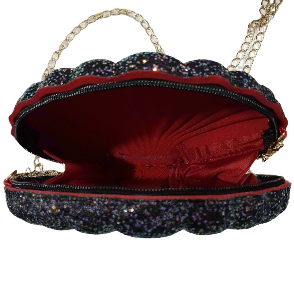 Black bag with gold shells best sale