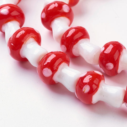 Bead, lampworked glass, opaque white and red, 13x12mm-15x14mm mushroom with  spots. Sold per pkg of 8. - Fire Mountain Gems and Beads