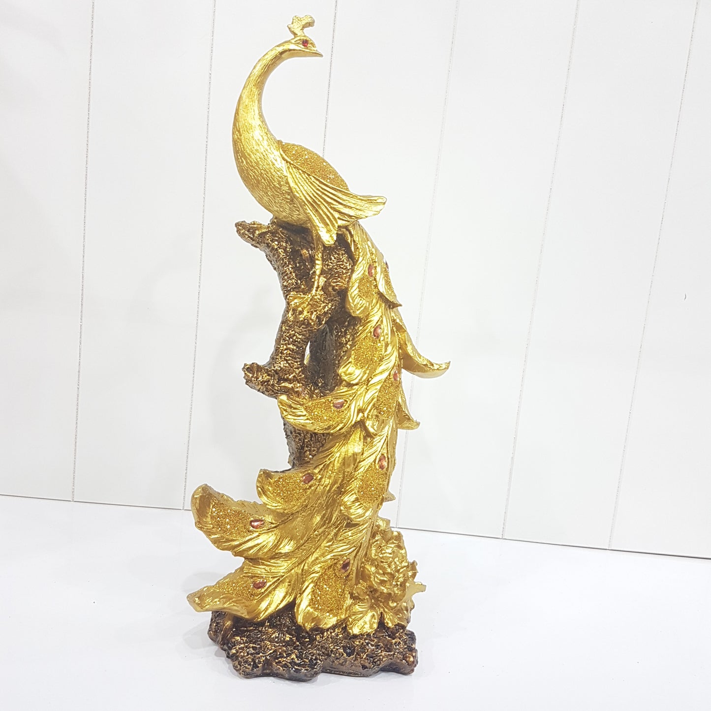 Golden Peacock Statue