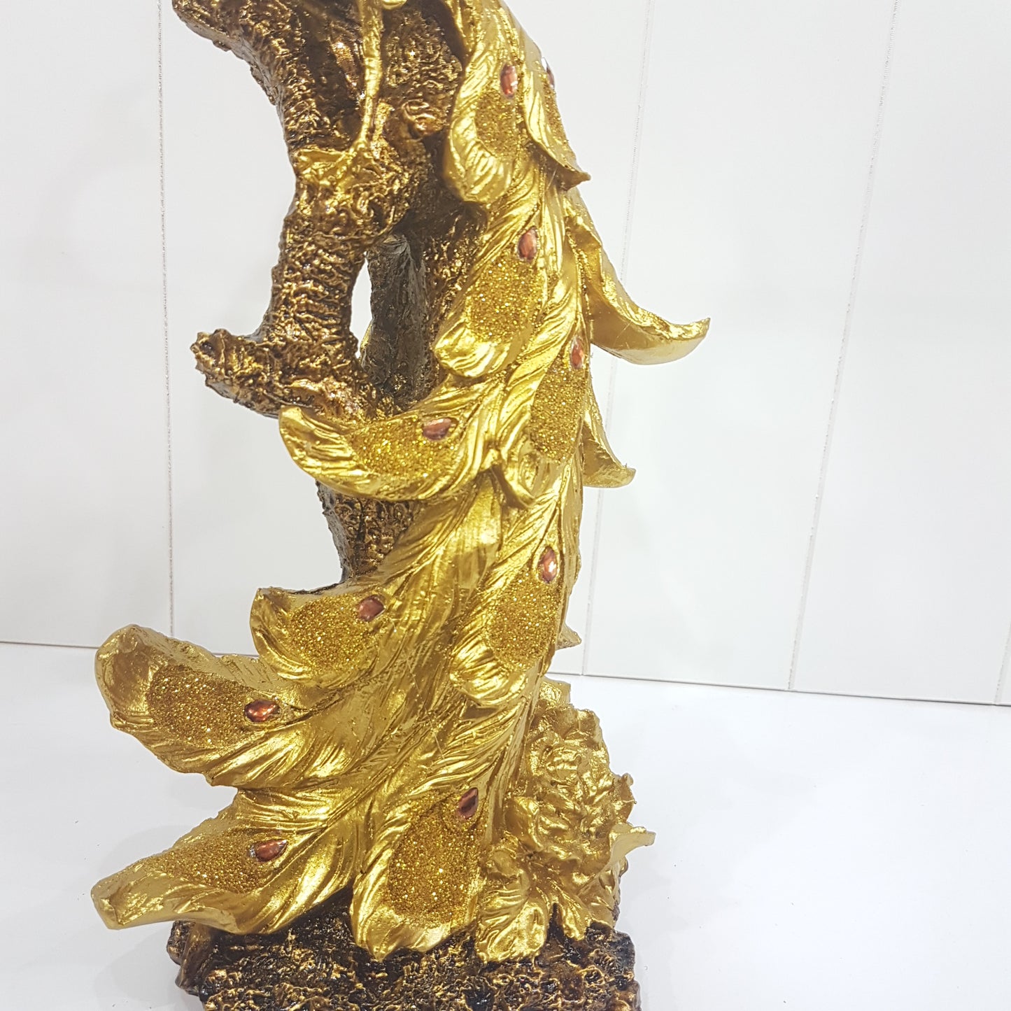 Golden Peacock Statue