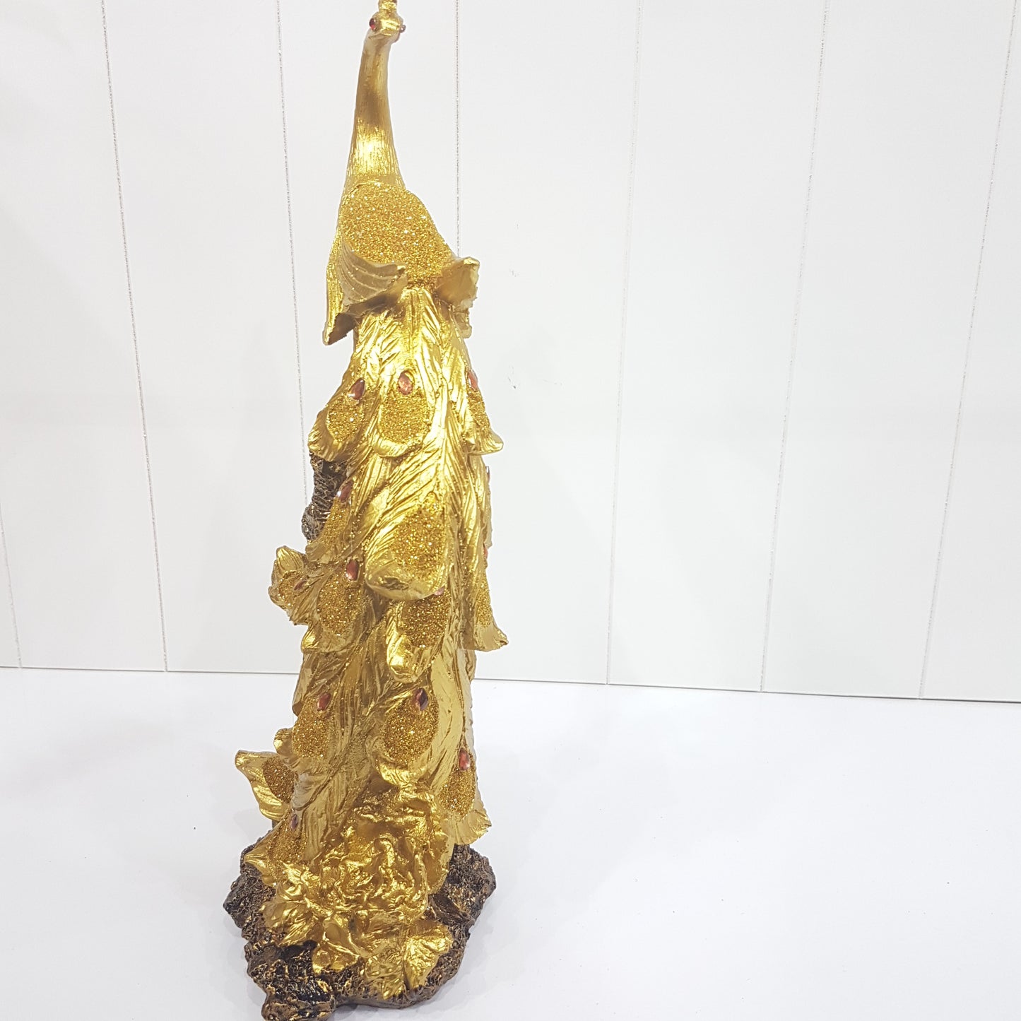 Golden Peacock Statue