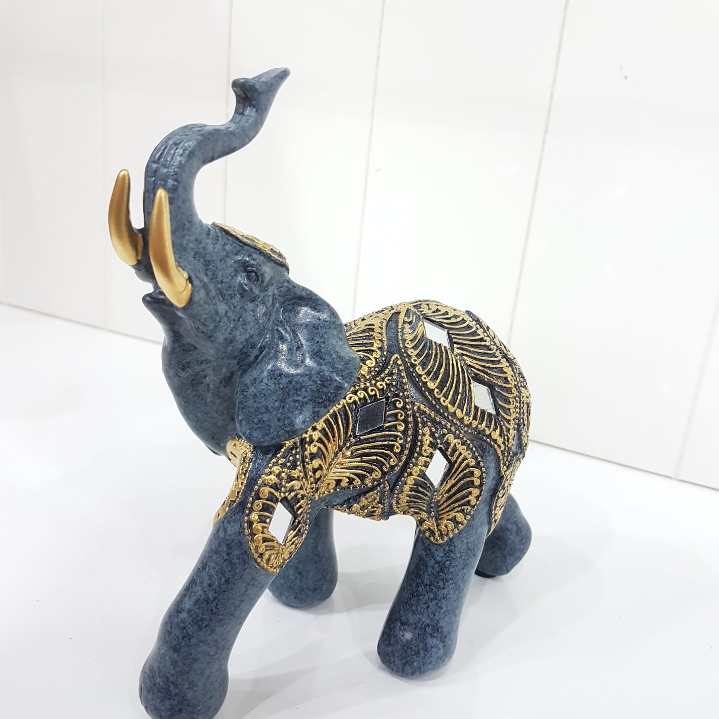 Resin Elephant with Peacock Feathers