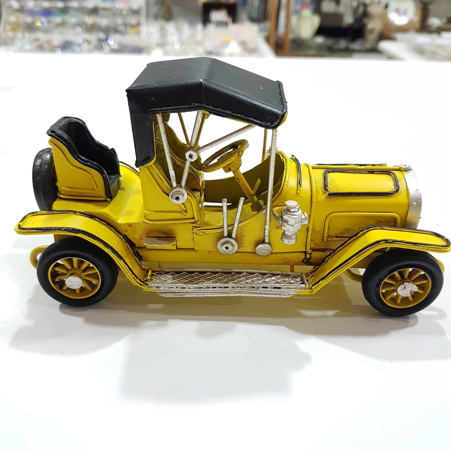 Small Yellow Vintage Model Car