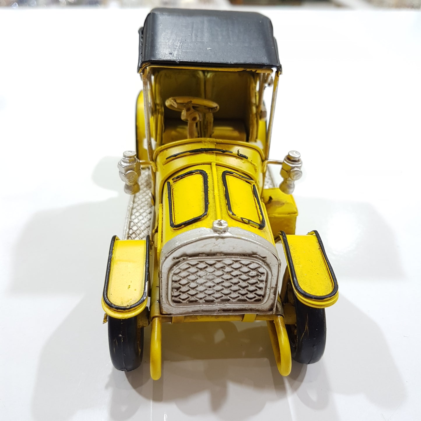 Small Yellow Vintage Model Car