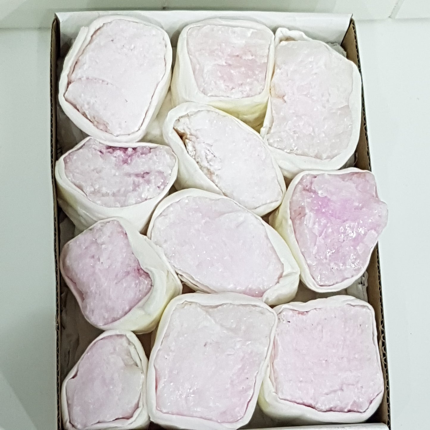 Box of Pink Aragonite Gemstones