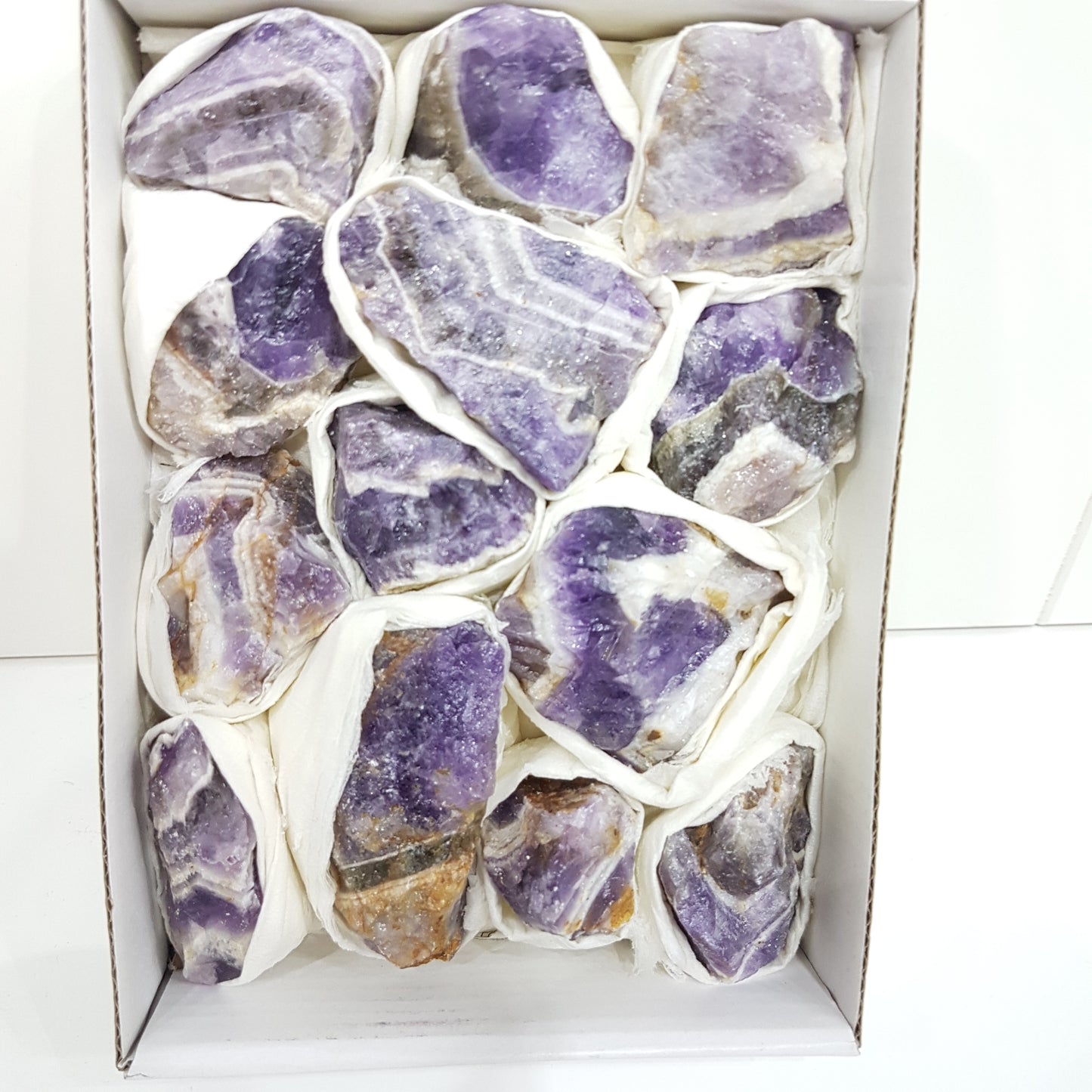 Box of Chevron Amethyst Gemstones