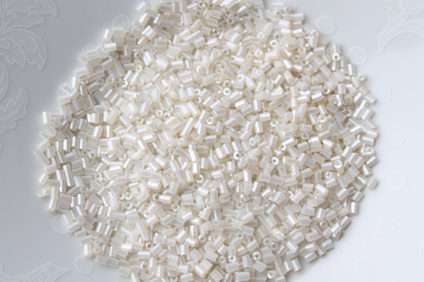 15g Two Cut Off White Seed Beads