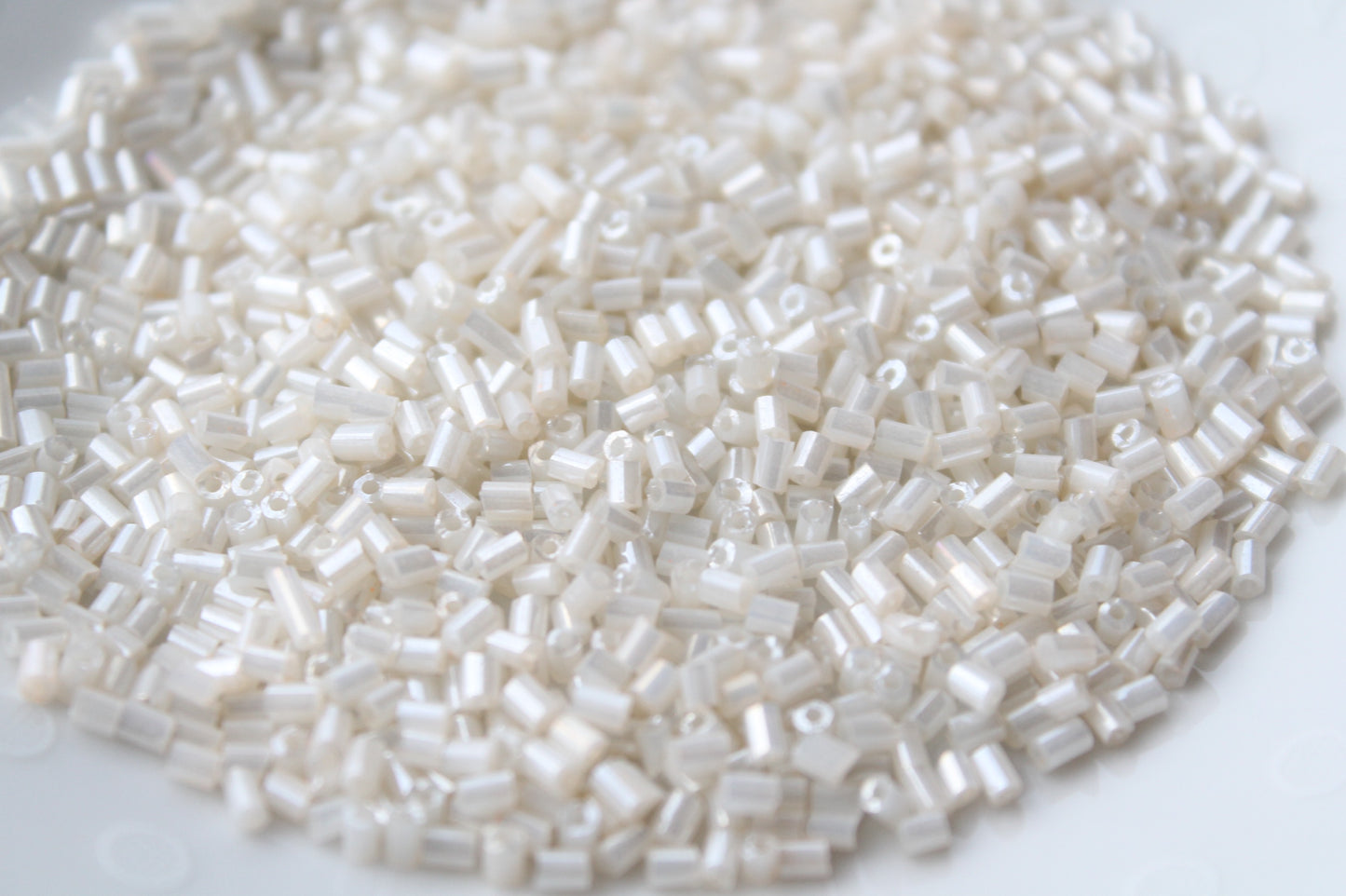 15g Two Cut Off White Seed Beads